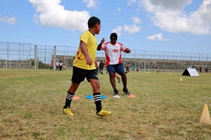 One kid and one coach talking